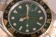 Fake Rolex GMT-Master II Green Dial Yellow Gold/Steel Watch